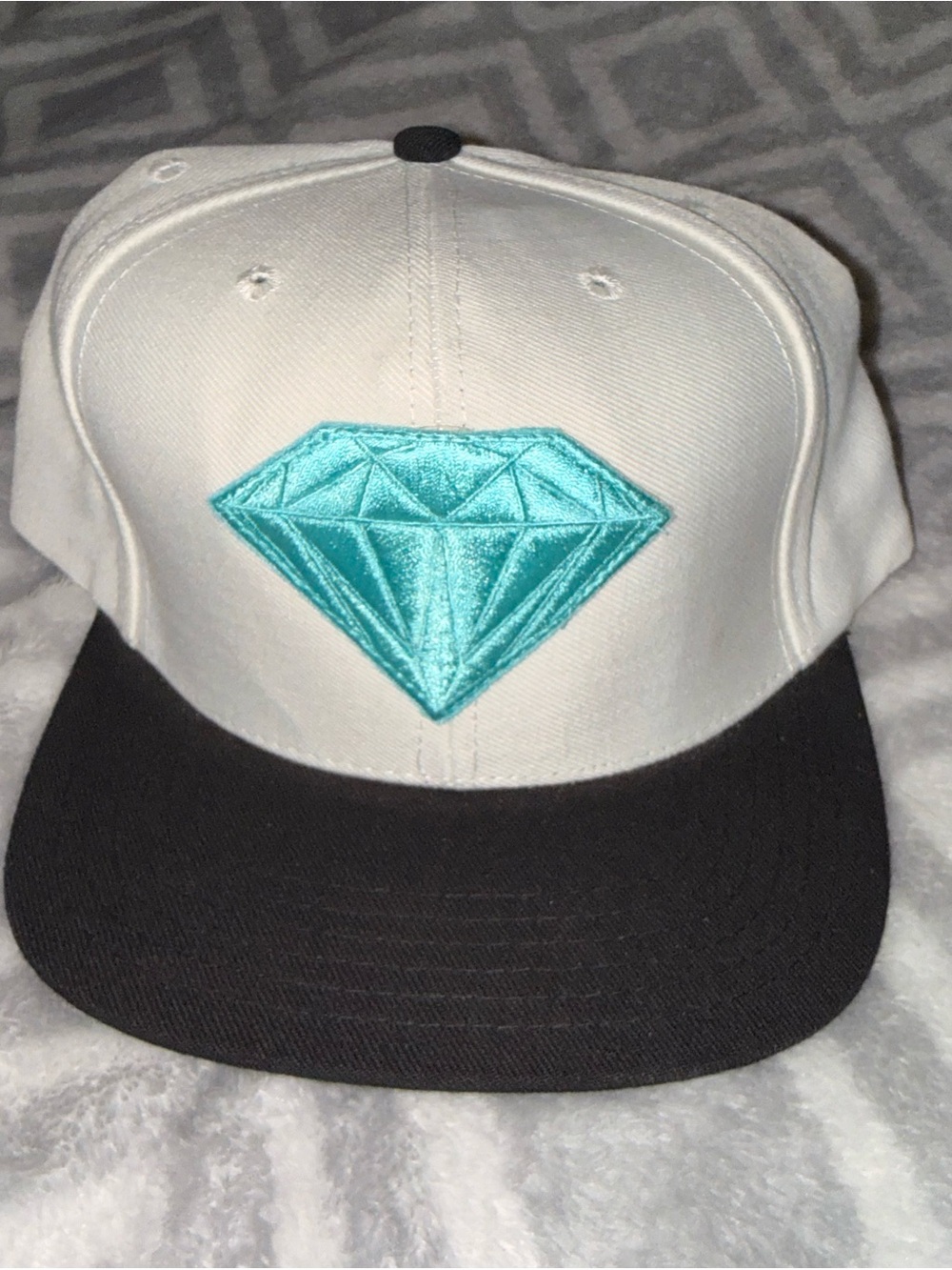 Diamond Supply Co. White Snapback Hat with Teal Diamond and Black Brim